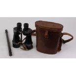 Cased pair of military binoculars (probably tank commander),; early telescopic sight