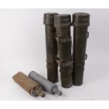 Three military ammunition carriers and two spent shell casings