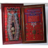 Framed Scots Guards 1660-1945 Campaign insignia display; Framed & glazed Titles of The Royal