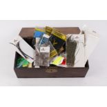 Wooden box with fly tying materials including silks, tools and flies