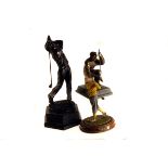 Golf, three models of golfers, the first a spelter figure imitating bronze of a golfer lining up the