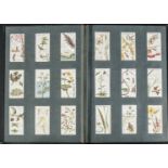 Cigarette Cards, mixture, a slot in picture album containing a mixture of cards from Wills, Players,