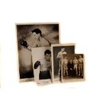 Boxing,  a group of four black and white press and promotional photographs, two signed, one of which