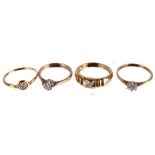 Four diamond set rings,  each on 9ct yellow gold mounts, 7g gross