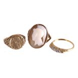 Three 19th century rings,  including a Mexican Maximilian jeton set souvenir ring, a shell cameo set