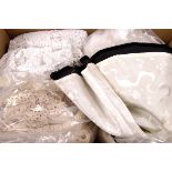 A quantity of antique lace fragments, silks, and crochet samples