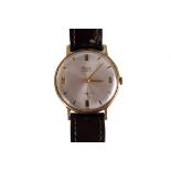 A 1960s 9ct gold Everite gentleman's dress watch, with silvered dial, and applied gold baton detail,