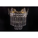 Lead Crystal Chandelier, with polished brass two tier design on leaf pattern supports with jewel and