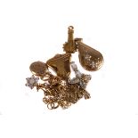 A collection of 9ct gold jewellery,  to include two lockets, a ruby and diamond cluster pendant, a