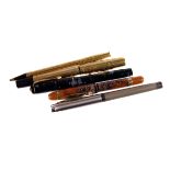 An early 20th century Waterman's rolled gold fountain pen and pencil,  engraved overall, the