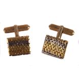 A pair of 9ct gold cufflinks,  with rectangular three colour woven link face, fully hallmarked on