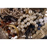A collection of costume jewellery,  to include simulated pearl necklaces, bangles, bracelets and