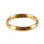 A 22ct gold wedding band, the plain ring, hallmarked to inner, size approx. M and 3.1g