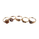 Four 9ct gold ruby set rings,  of various designs and sizes, together with an Austrian 14ct gold