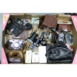 Konica III Camera, with a varied selection of items includinf a Zoomar lens, a Rodenstock Loup and