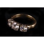 A three stone CZ ring,  mounted in 9ct gold, finger size K