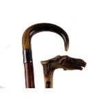 A 19th century Greek carved wooden walking stick,  the handle modelled as a horse's head,