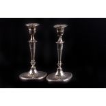 A pair of Edward VII silver table candlesticks, Sheffield 1905, by Hawksworth Eyre & Co., in the