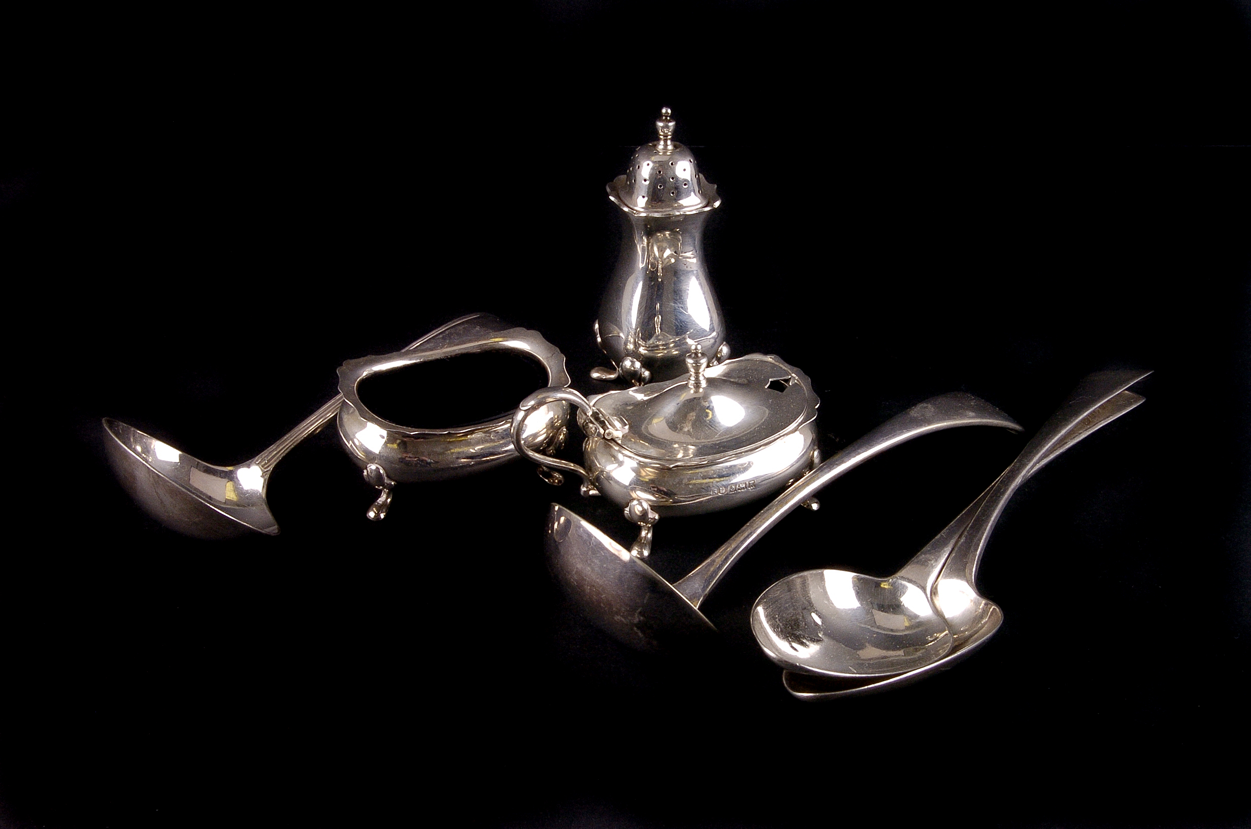 A pair of George III table spoons by Eley & Fearn,  London 1804, together with a matched three piece