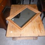 A pine coffee table,  with turned wooden baluster legs, and lower platform, together with pine