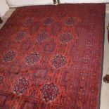 A large Tekke Turkmen rug,  the deep red field with all over medallion design, 203 x 290cm