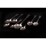 Eight early Victorian Newcastle silver spoons, all fiddle and shell pattern with monogram, including