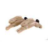 A pair of Art Deco ceramic leaping rabbits, in the style of John Skeaping, 13cm long
no apparent