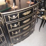 A pair of 1960s ebonised bow front chests,  of four graduated drawers, decorated with neoclassical
