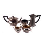 A three piece silver plated shaped oblong tea service,  with gilt interiors, together with cased