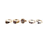 Five 9ct gold gem set rings,  11.7g gross