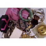 A collection of costume jewellery,  including brooches, paste set rings and necklaces, as well as