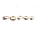 Five 9ct gold gem set rings,  9.4g gross