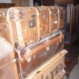 Two canvas travelling trunks,  one reinforced with wooden strapping (2)