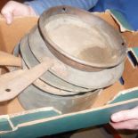 A graduated set of three copper pans,  together with skillets and other items