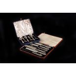 A group of silver and silver plated flatware,  the silver items comprising three cased six piece