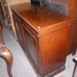A Victorian mahogany press cupboard with two door,  on plinth base,  122cm  wide