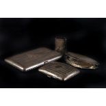 A George V silver cigarette case, together with another smaller example, a silver compact and a