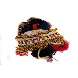 A Swaziland flag,  together with other elements of African beaded  costume