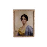 An early 20th century oil on canvas board quarter length portrait, showing a society lady with