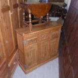 An Old Charm style shoe cupboard,  with concertina linen fold doors (2)