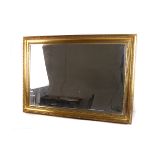 A gilt framed bevelled glass mirror, 74cm x 102.5cm