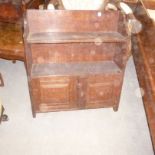 An oak wall cabinet,  composed of two shelves,  a double-door cupboard below, 70cm high