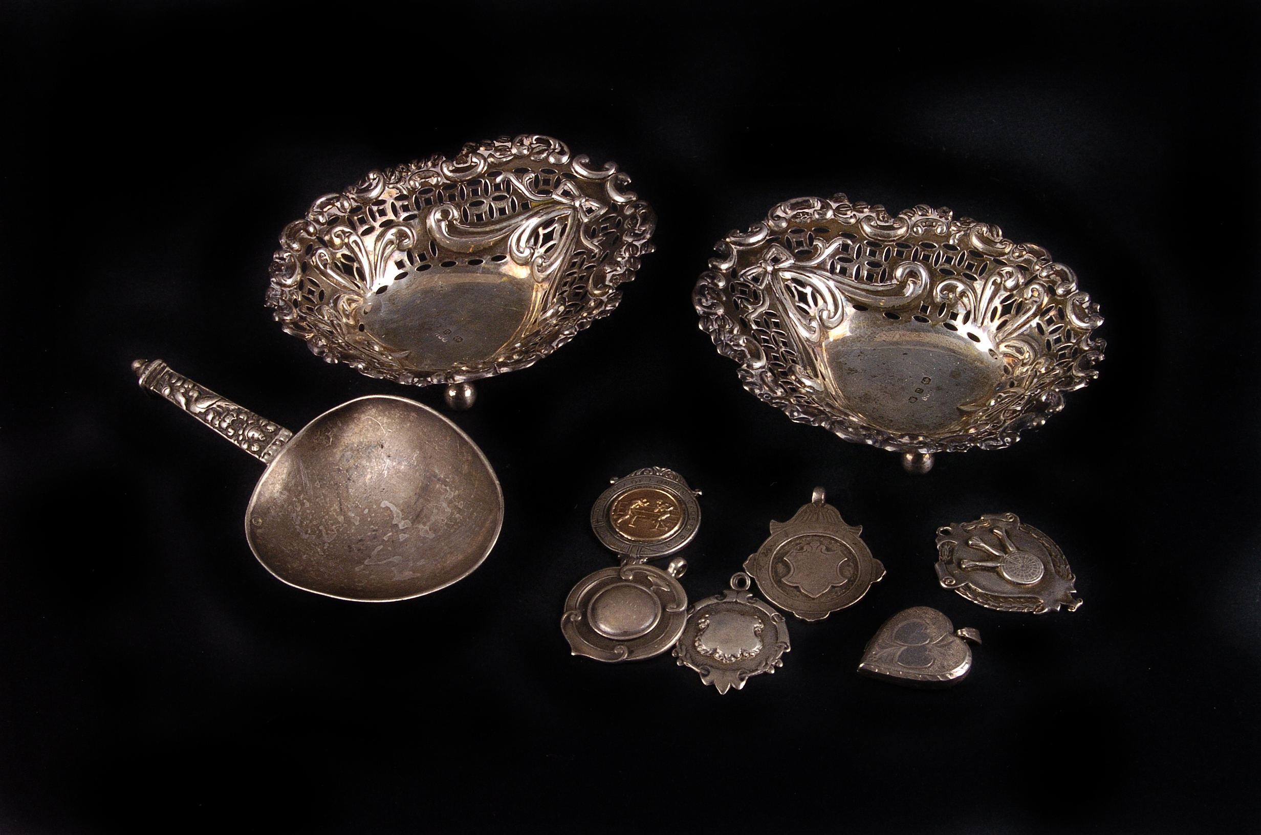 A group of small silver,  including a pair of pierced border bon bon dishes, a Norwegian caddy