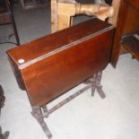 A Victorian red walnut Sutherland table,   with canted corners and on turned supports, 60cm wide