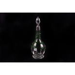 A late Victorian silver collared glass decanter, the spherical body with green glass serpent