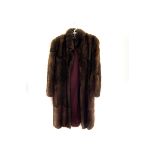 Two vintage fur coats, both three quarter lengths, one possibly mink and one possibly rabbit (2)