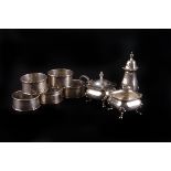 A group of small silver,  including five engine turned napkin rings, and a pepper, salt and