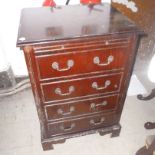 A mahogany entertainment cabinet,  with blind  draw front door, 84.5cm high