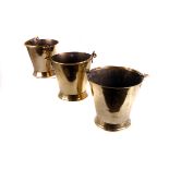 A set of three early 19th century brass milk pails,  graduated in size, stamped 'NARANG' on the