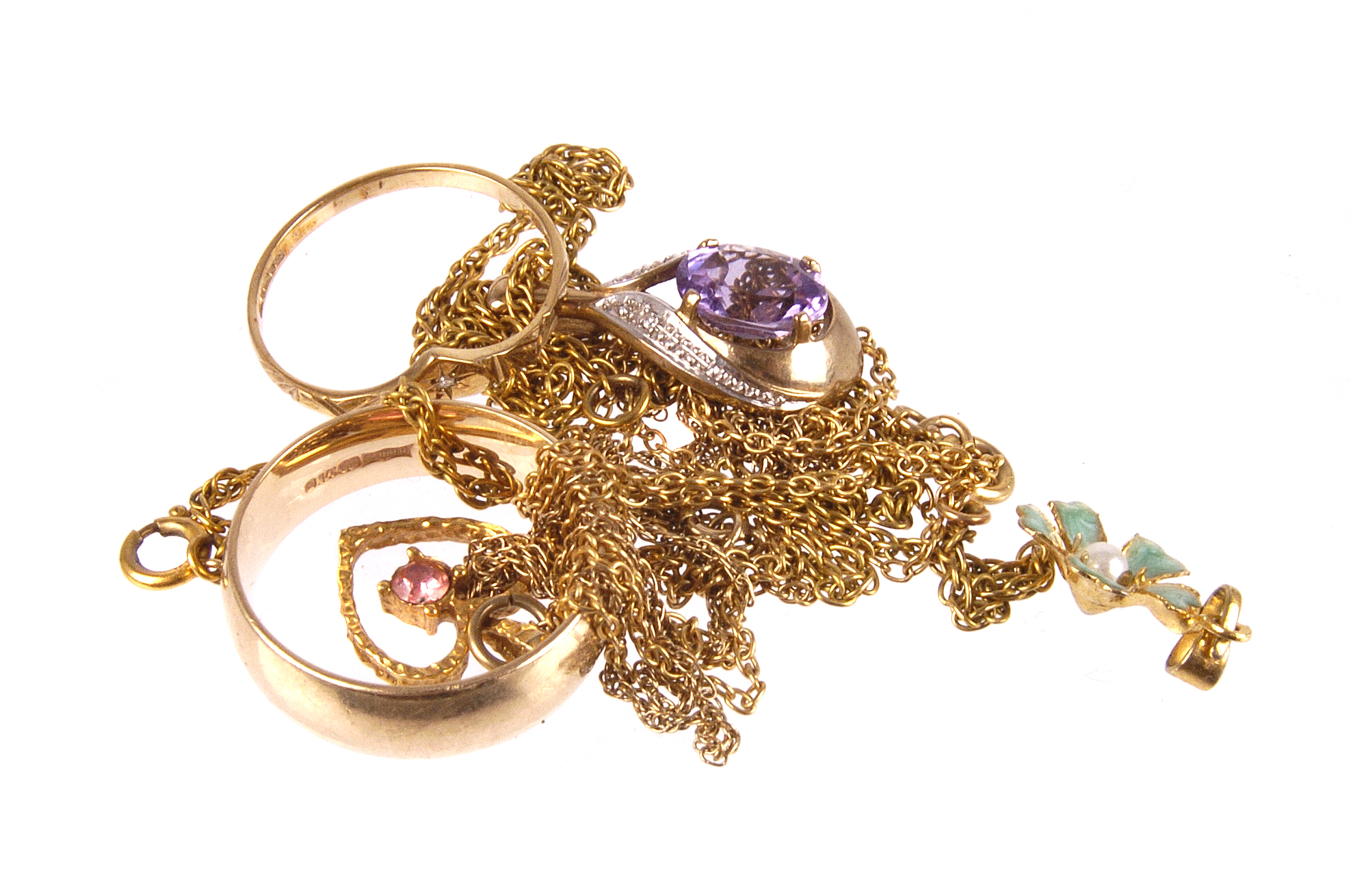 A small group of 9ct gold jewellery,  including two rings, an amethyst and diamond pendant, and